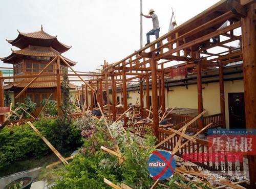 南宁楼顶“宫廷酒店”被拆除 造价约300万元